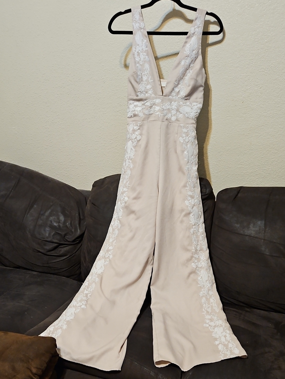 Sleeveless Beige Jumpsuit with White Lace Trim
